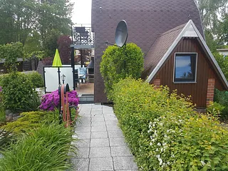 Bild: Finnhaus mit Waldblick im Idylischen Grün