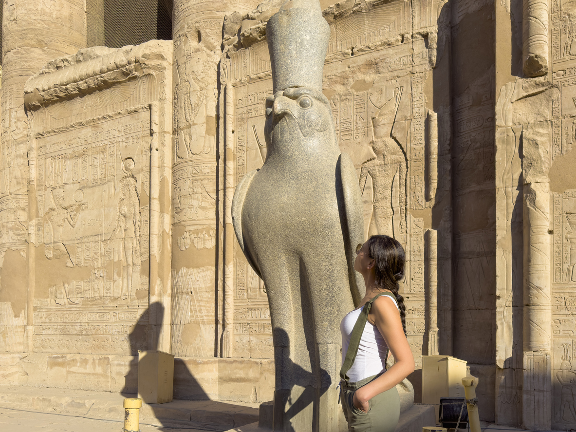 a woman in front of edfu temple, Trip to Egypt