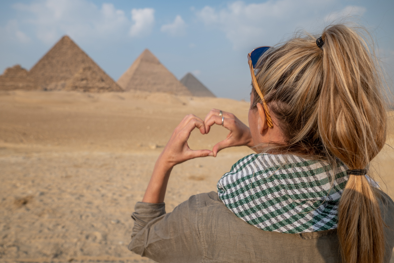 woman loves the pyramids of Giza, Taste of Egypt Jordan Tours