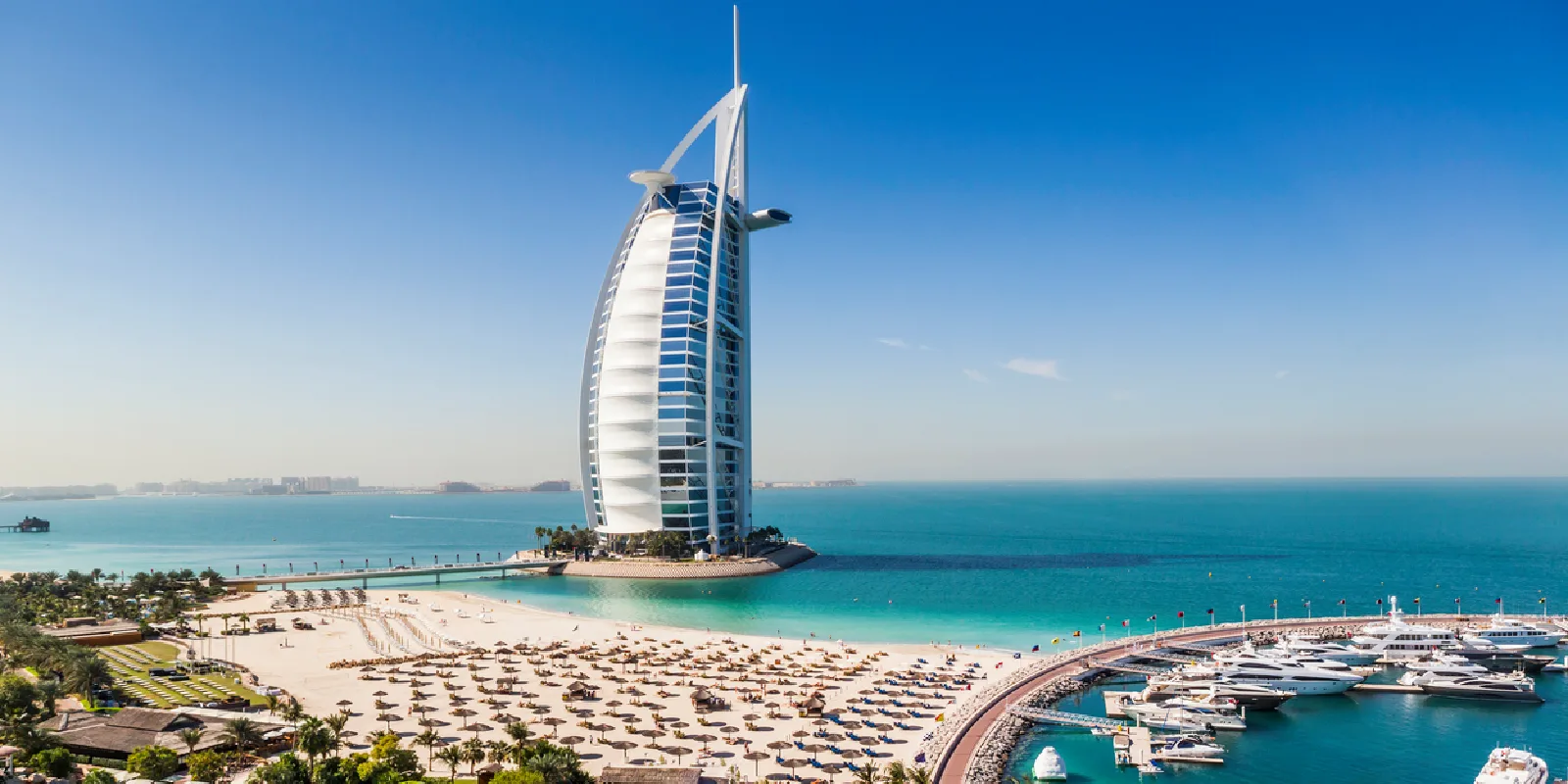 View of Burj Al Arab with its marina and private beach in Dubai.