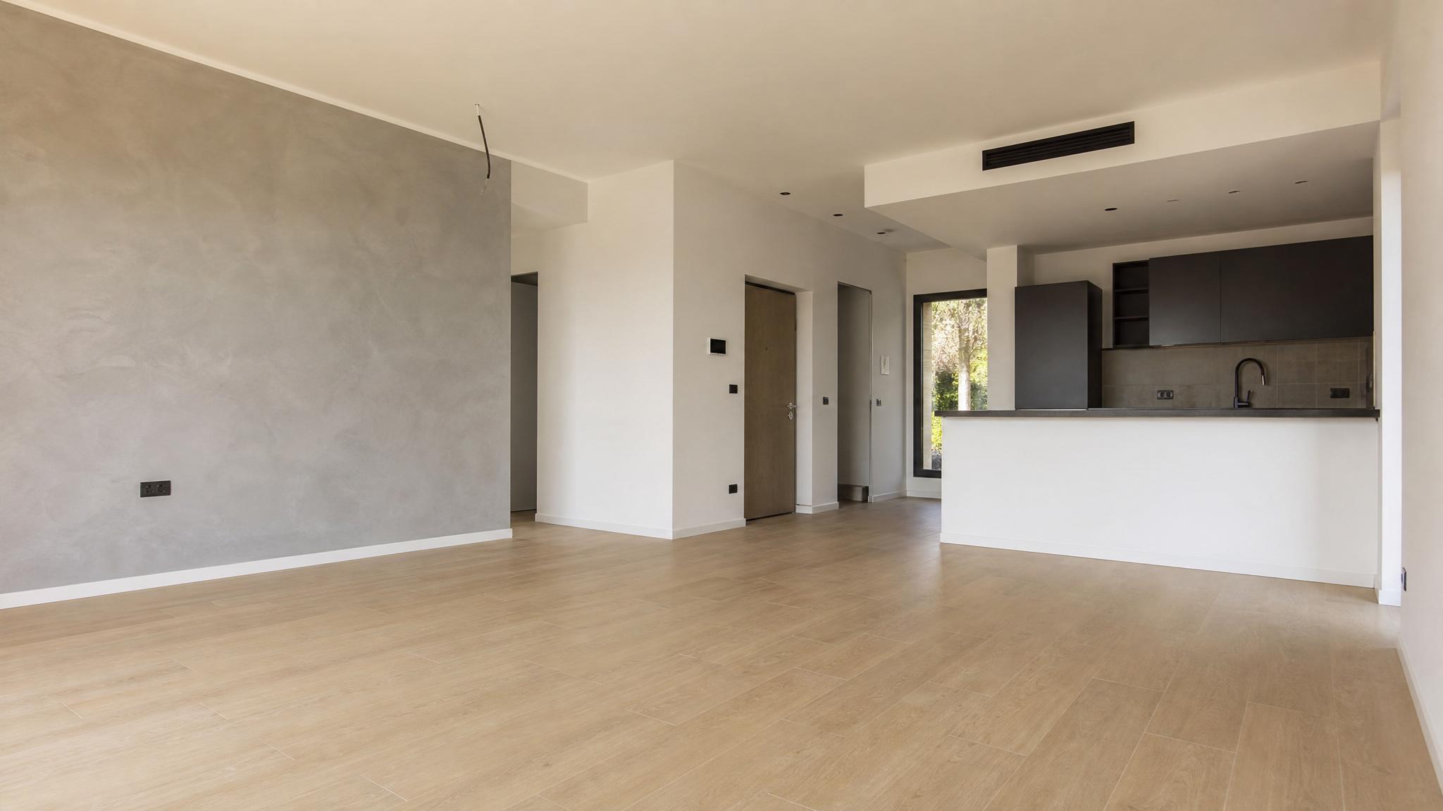 Before transformation of an Italian modern open-plan living room.