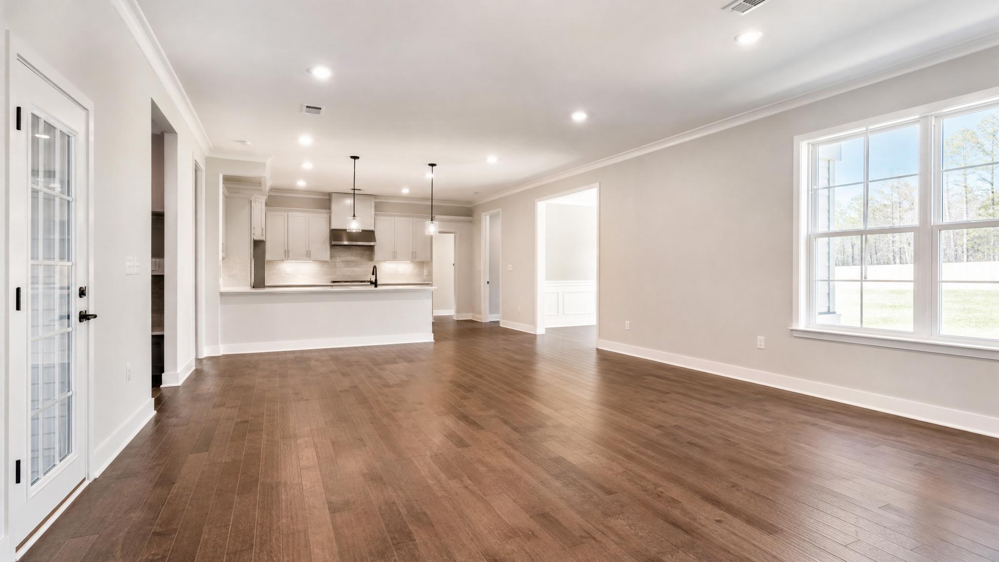 Visual of an open-plan living room before staging.