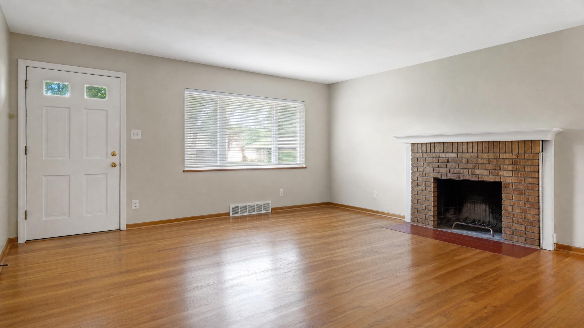 Before image of an empty small living room
