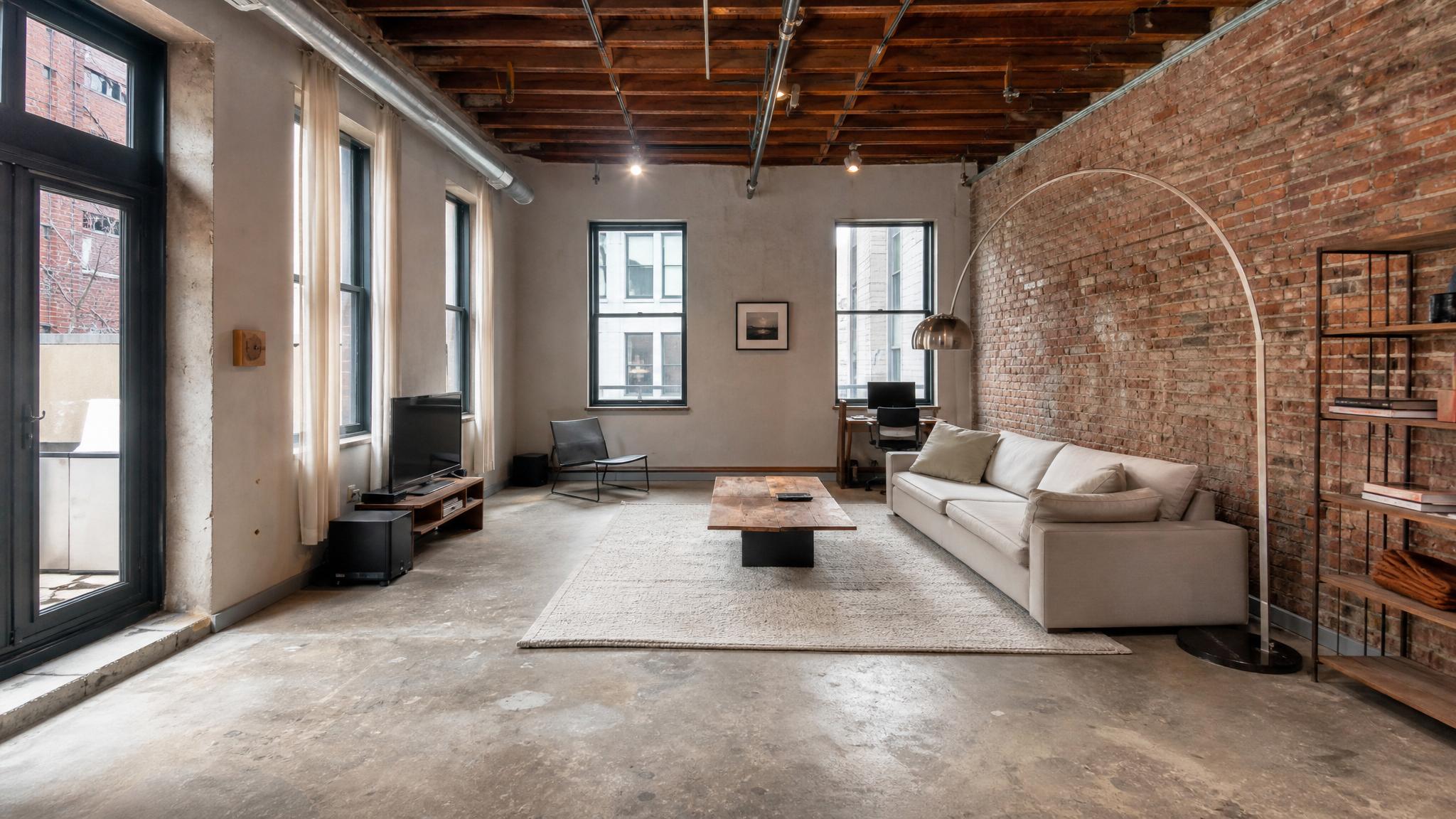 Before photo of an industrial-style living room