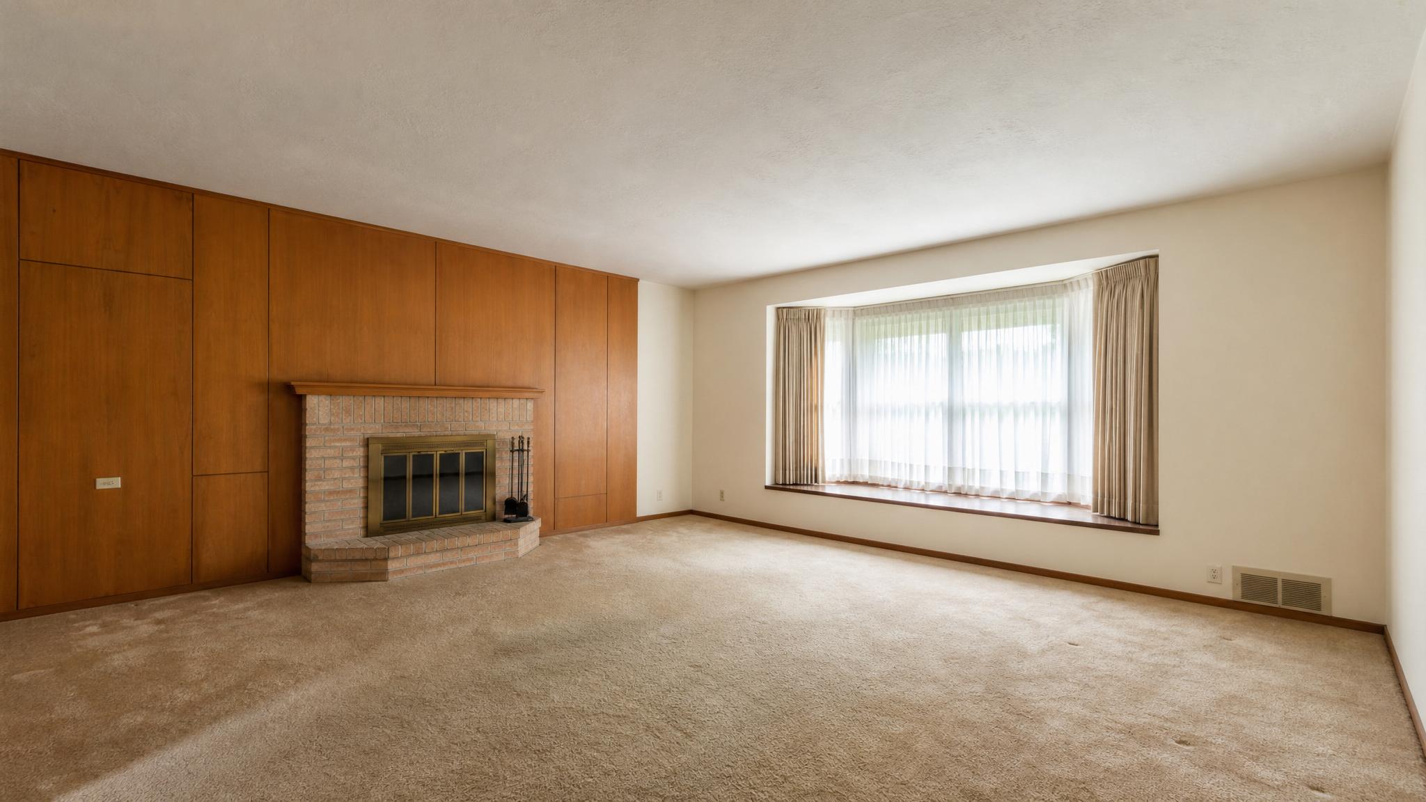 Before image of an outdated living room