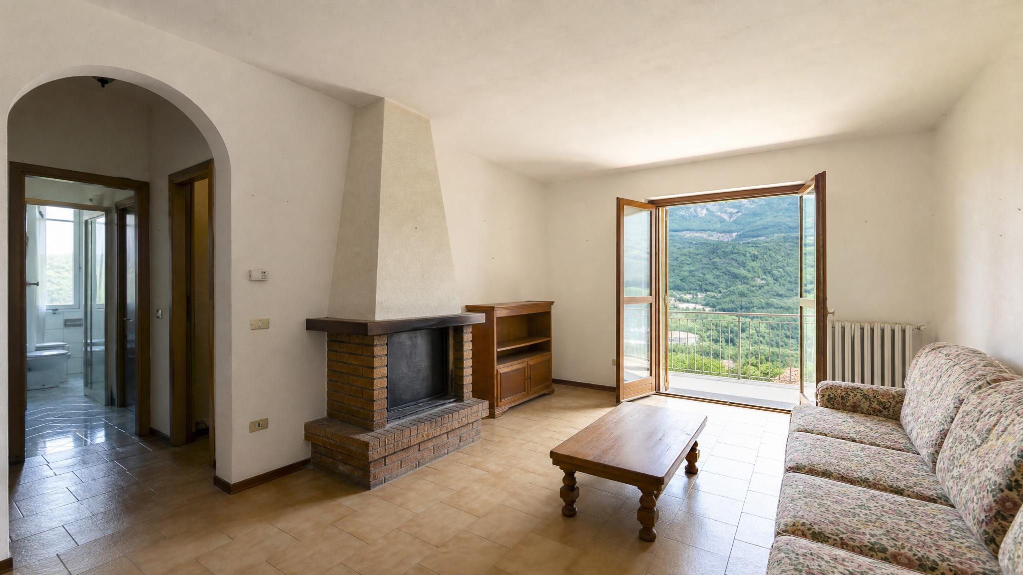 Before image of a small Italian living room