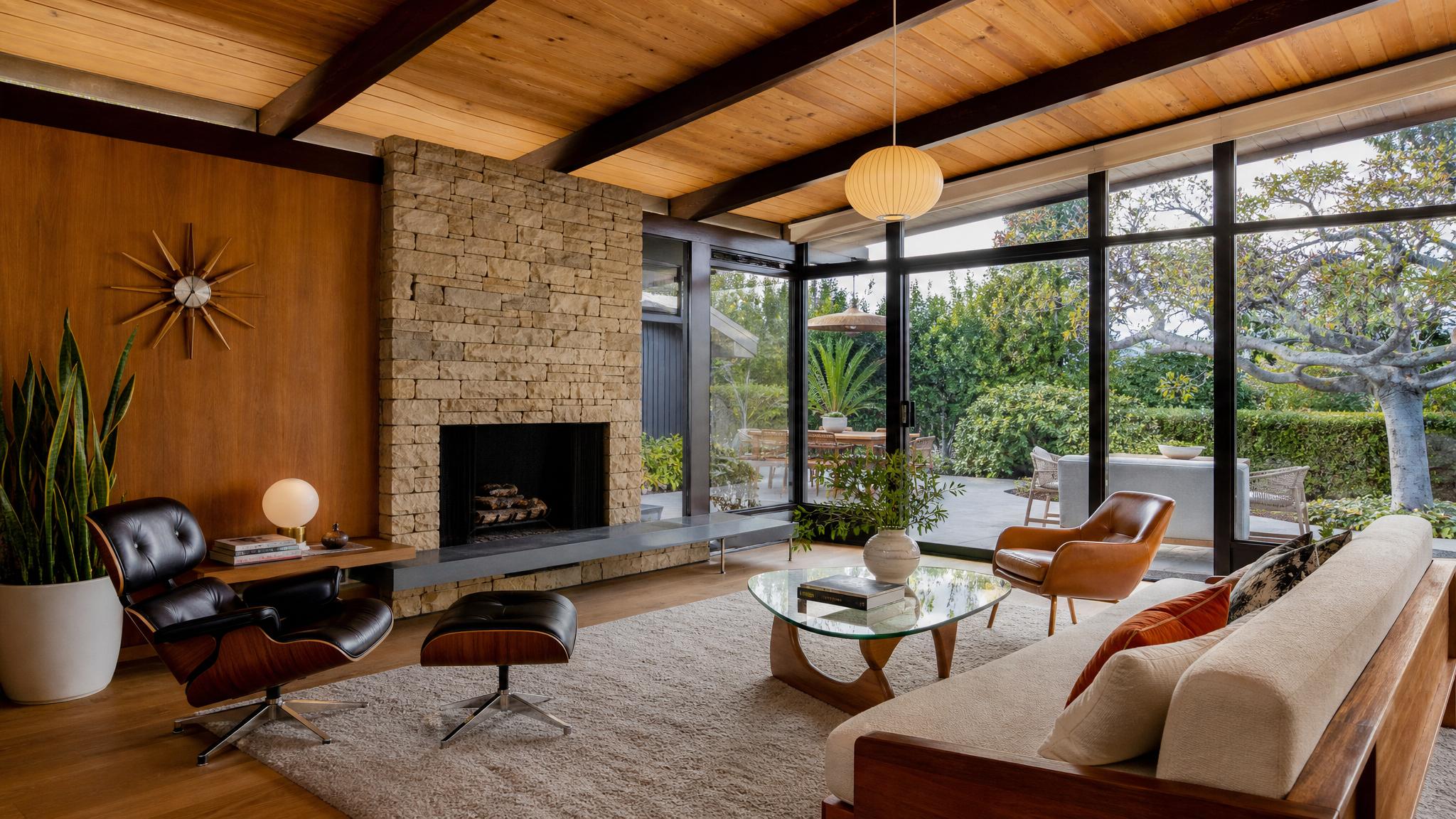 Mid-century modern living room with iconic furniture pieces.