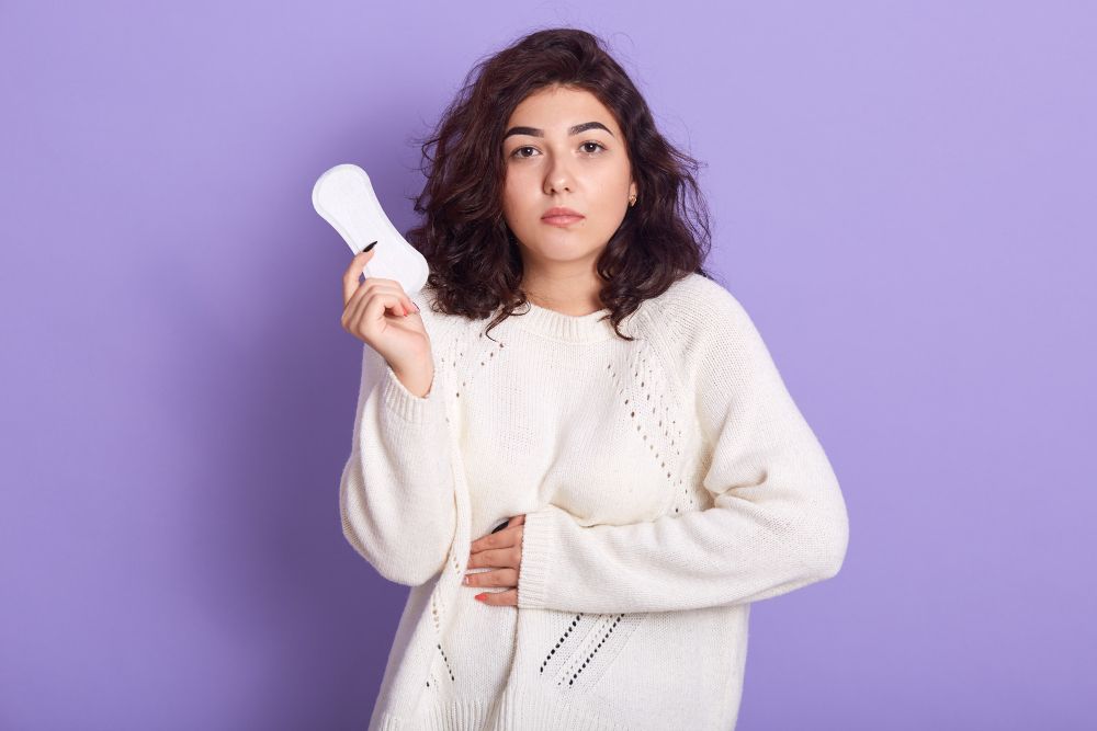 mulher com oscilação de humor pela menstruação
