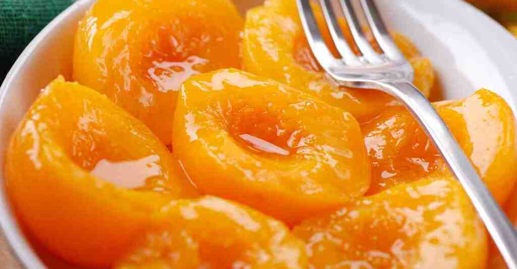 scopri la ricetta originale delle pesche sciroppate