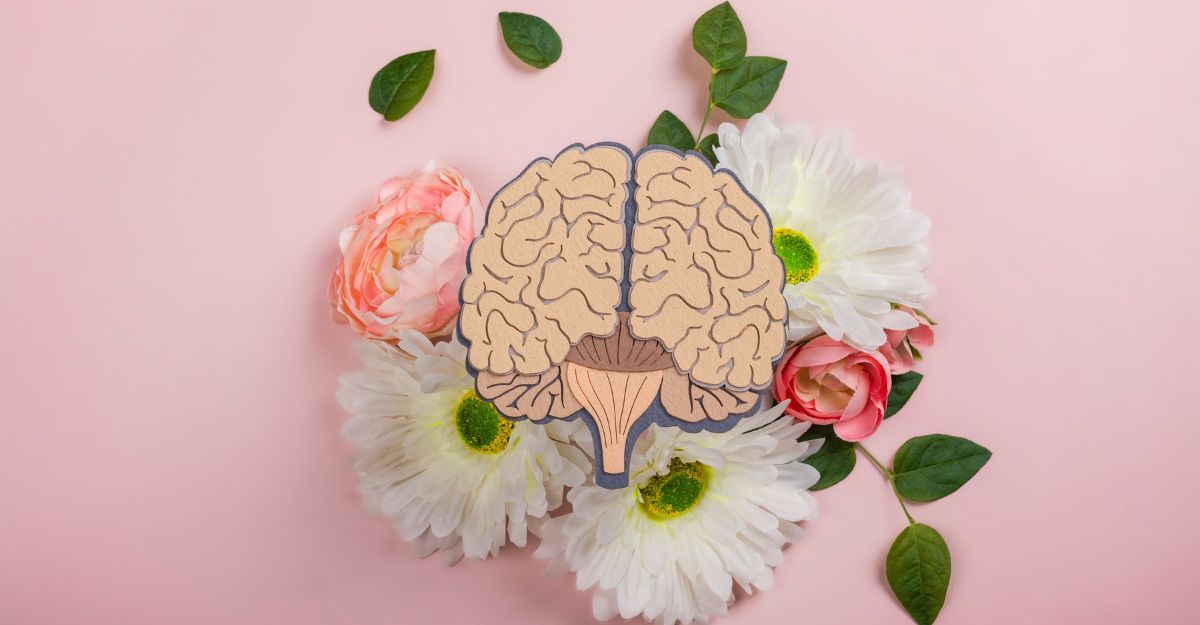 cervello-su-sfondo-con-fiori-rosa