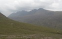 Regen komt aangewaaid boven Liathach