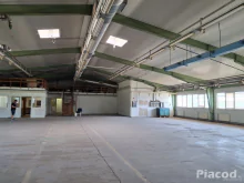 2100 m2-es acélvázas raktár\gyárépület, 1.2 ha telken