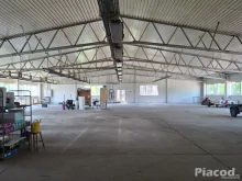 2100 m2-es acélvázas raktár\gyárépület, 1.2 ha telken