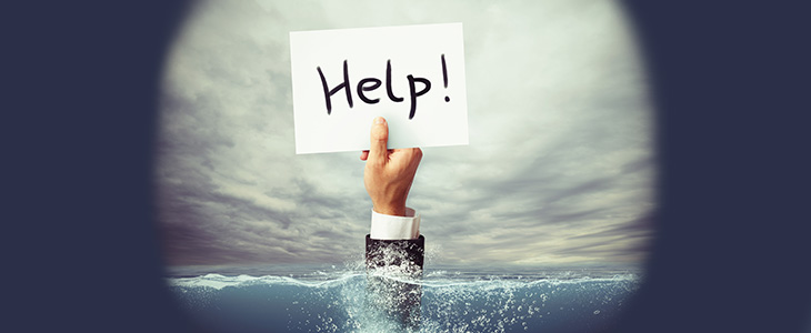 730x300 Hand mit Help-Schild