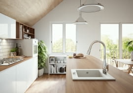 Aranżacja otwartej kuchni. Zlewozmywak jednokomorowy biały KIZZ, Bateria zlewozmywakowa stojąca z wysuwaną wylewką Genova VerdeLine