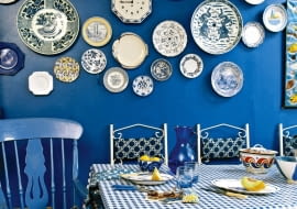 Modern blue dining room table chairs check pattern cloth ceramic wall plates interiors rooms cool colours display collections