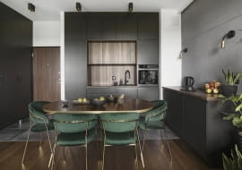 Minimalizm i ciemne kolory - mieszkanie na warszawskim Wawrze