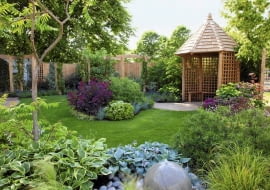 Water feature surrounded by pebbles, Stipa tenuissima and Hosta - 'The Urban Retreat', Bronze medal winner, RHS Hampton Court Flower Show 2010