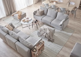 Meble tapicerowane zapewniają wygodę i wprowadzają do wnętrza przytulną atmosferę.