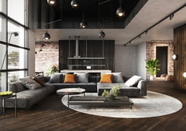 Na podłogę w ciemnym kolorze mogą sobie pozwolić właściciele mieszkań o dużym metrażu, w których stanie się ona dekoracją samą w sobie.