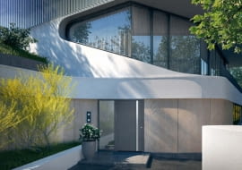 Dobrze dobrane kolorystycznie drzwi wejściowe mogą dyskretnie wpisać się w bryłę budynku, nawet jeśli mają dość duże gabaryty. Na zdjęciu: drzwi stalowe ThermoSafe wzór 568, Ud od 0,88 W/(m?K), z przegrodą termiczną, ocieplone pianką PU, klasa RC3, cena od 12 944 zł (netto), HÖRMANNN