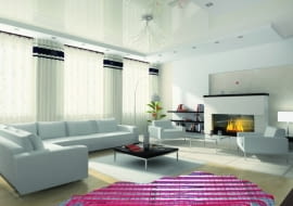 Interior of the room with fireplace and furniture