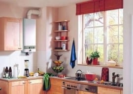 Dzięki mniejszym obudowom i estetycznemu wyglądowi nowe termy bez wstydu można zamontować w nowej kuchni.