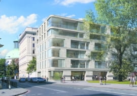 Jednym z niewielu wyróżniających się wielkomiejskich projektów pokazanych na wystawie jest apartamentowiec przy ul. Traugutta planowany przez firmę Dom Development. Architekci z pracowni Wojciecha Hermanowicza i Stanisława Rewskiego pracują nad przekształceniem w luksusowy budynek mieszkalny blisko stuletniej kamienicy hr. Krasińskich przy placu Małachowskim i dostawienie nowego budynku na jej tyłach - od strony ul. Traugutta.
