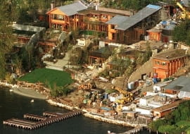 After seven years of construction and $60 million, Microsoft mogul Bill Gates and wife Melinda have finally moved into their Lake Washington waterfront home in Medina, Washington, a suburb of Seattle. It was announced September 28 that Gates was the richest man in the world, with an estimated net worth of $39.8 billion. The 20,000 square foot home spans five acres, has a 20-seat movie theater, a 30-car garage and a 20-room main living area. Although landscape work continues, the interior of the house is complete. GATES