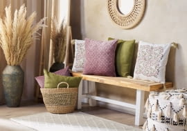 Bawełniana poduszka dekoracyjna motyw roślinny z frędzlami 45 x 45 cm wielokolorowa CARISSA