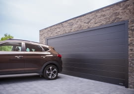 Bezpieczne, nowoczesne i trwałe bramy garażowe - co wybrać?