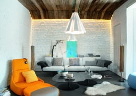 W części wypoczynkowej strefy dziennej sofa firmy Arper. Lampy spódniczki marki Delta Light zaprojektował Tim Van Steenbergen. Obraz Mariusza Andryszczyka.