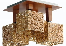 Wybierzmy lampę, która rozjaśni blat stołu, ale nie będzie świecić nam w oczy. Zwróćmy też uwagę na żarówkę, zwłaszcza na jej rodzaj i moc. Jeśli zaś chodzi o urodę i styl lampy - mamy w czym wybierać. <BR >Rynek. Abaka, plecionka z liści palmy, metal i drewno, 29 x 29 cm, max 4 x 40 W Praktiker, 259 zł