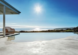 Infinity pool overlooking sea