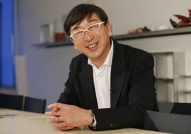 Toyo Ito, the Japanese architect awarded the 2013 Pritzker Architecture Prize, smiles during an interview with The Associated Press at one of his offices in Tokyo Monday, March 18, 2013. When he said why he especially likes Sendai Mediatheque, the public library that ranks among his most famous works, Ito, the sixth Japanese to win the honor likened to a Nobel Prize for architecture, said he likes to see people napping and relaxing inside the transparent structure. (AP Photo/Koji Sasahara)