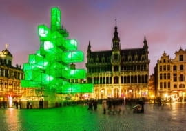 An abstract light installation replaces the traditional Christmas tree at the Grand Place in Brussels, Saturday Dec. 1, 2012. Traditionally, a 20m (65ft) pine tree from the forests of the Ardennes decorates the city's central square, the Grand Place. This year, it has been replaced with a 25m (82ft) construction. (AP Photo/Geert Vanden Wijngaert)