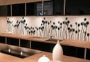 Modern design trendy kitchen with black and wood elements SLOWA KLUCZOWE: interiors home kitchen modern commercial domestic cabinets wood residential structure design house counter indoors stove cooking luxury decorating steel stainless sink drawer building showcase built floor decor architecture construction light designer hardwood dining food lifestyles chef furniture style metal new oven real room shiny space steel style top white black