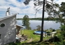 dom na wyspie, dom nad morzem, drewniany dom nad morzem, wakacyjny dom, dom na lato, skandynawski styl