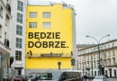 Będzie dobrze :) - mural od Good Looking Studio na Domu Towarowy Braci Jabłkowskich (ul. Bracka 25) w Warszawie
