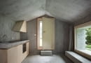 Concrete Cabin - betonowy domek w szwajcarskich Alpach; proj. Nikish Sano Walder Architects