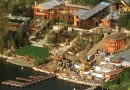 After seven years of construction and $60 million, Microsoft mogul Bill Gates and wife Melinda have finally moved into their Lake Washington waterfront home in Medina, Washington, a suburb of Seattle. It was announced September 28 that Gates was the richest man in the world, with an estimated net worth of $39.8 billion. The 20,000 square foot home spans five acres, has a 20-seat movie theater, a 30-car garage and a 20-room main living area. Although landscape work continues, the interior of the house is complete. GATES