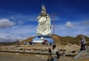 People work at the base of the Virgin of the Socavon (patron saint of miners) statue during its construction at the Santa Barbara hill in the outskirts of the Oruro, some 200 km (124 miles) south of La Paz, January 18, 2013. The statue measures 45 metres (148 feet) in height and stands at 3850 meters (12,631 feet) above sea level. The statue is expected to complete by February 2, 2013 according to its sculptors. REUTERS/David Mercado (BOLIVIA - Tags: RELIGION SOCIETY)