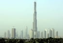 The Burj Dubai tower rises in front of Sheik Zayed highway towers in Dubai, United Arab Emirates, still under construction, Friday, Sept. 14, 2007. The Burj Dubai surpassed Canada's Toronto-based CN Tower on Thursday, which at 1,822 feet, had been the world's tallest free-standing structure since 1976, the developers said. Burj Dubai, the world's tallest building since July, has also become the tallest free-standing structure on earth, reaching 1,822 feet, the developers said. The Dubai Tower's final height is a closely guarded secret, but completion of the concrete, glass and steel structure is expected by the end of 2008. (AP Photo/Kamran Jebreili)
