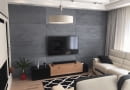Szary beton architektoniczny na ścianie w salonie