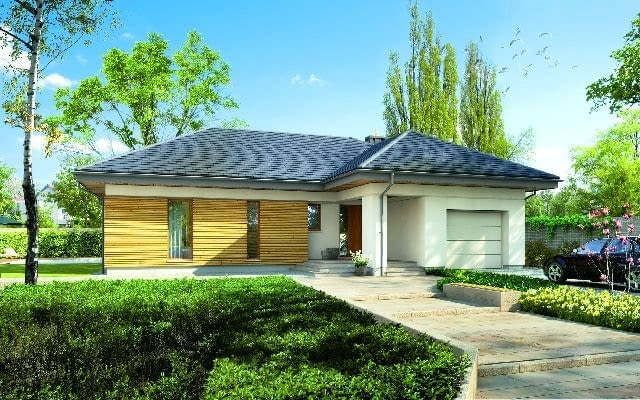 Dom z garażem w bryle - zajmuje mniej miejsca na działce niż dwa osobne budynki i jest wygodniejszy dla domowników, bo garaż można łatwo połączyć z resztą domu