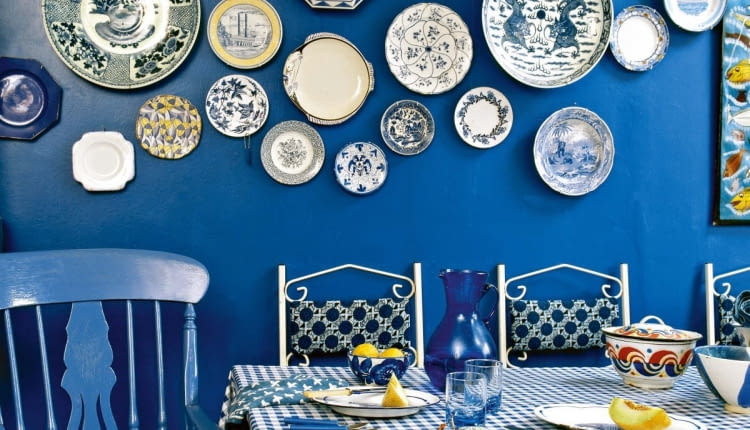 Modern blue dining room table chairs check pattern cloth ceramic wall plates interiors rooms cool colours display collections