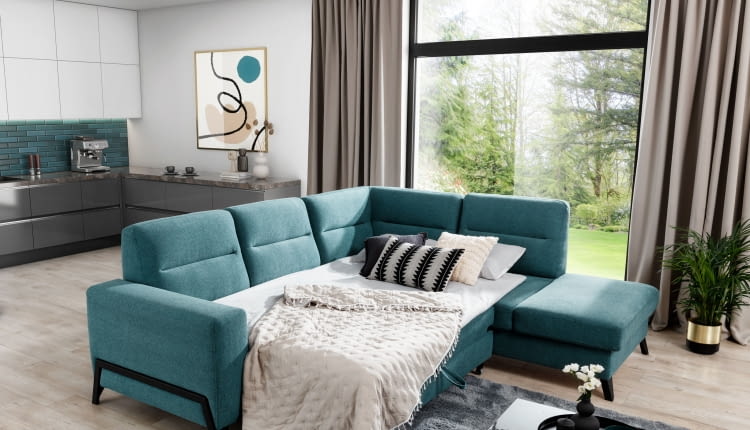 Narożnik z funkcją spania do salonu - jak wybrać?