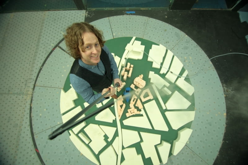 Justin Cunningham ULeeds (Bridgewater Place) - Birds eye shot of Justin towering over small scale model.