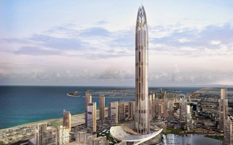 Wieżowiec The Nakheel Tower ma stanąć w Dubaju. Został zaprojektowany przez pracownię Woods Bagot i docelowo ma osiągnąć wysokość ponad 1000 metrów. Gdy powstanie pobije tym samym dotychczasowego rekordzistę - wieżowiec Burj Dubai (818m). Niestety z powodu trudności z finansowaniem inwestycji, jej deweloper - kontrolowana przez rząd ZEA firma Nakheel - zawiesiła realizację. Według oficjalnych informacji wznowienie budowy tego imponującego wieżowca ma nastąpić w przyszłym roku. wieżowce, wieżowiec, kryzys, The Nakheel Tower, Woods Bagot, Dubaj, ZEA