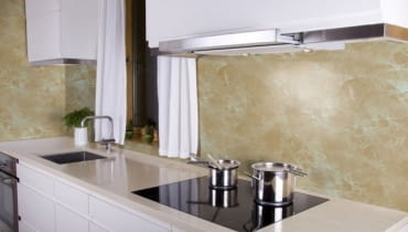 Minimalistic white kitchen with two sauce pans